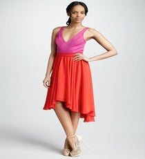Country Club Gala — An unfussy silk dress sends the right message at a more formal affair, while this high-low hem gives an otherwise conservative frock a little ‘tude. The best part: It’s versatile enough to rock day to night. Skip a necklace with this neckline (it'll elongate your neck...) and opt for a statement cuff and strappy metallic heels, instead. Bonus: This dress was made for dancing.
Black Halo Francis Colorblock Dress, $298, available at Neiman Marcus. neiman