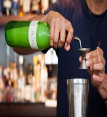 Step 1: Measure and pour lime juice into a shaker. 044_SpicyCocktails_4th