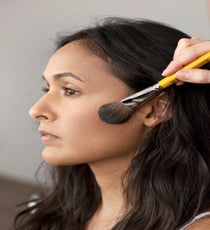 To start, contour the cheek using a matte bronzer to fake that high, sculpted cheek look. 35_HalloweenLook2_091512_008