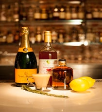 Vanilla Charentais, Serves 1
You'll Need:
2 oz Brut Champagne (we used Veuve Clicquot)
1 oz vanilla-infused brandy
.75 oz rosemary honey
1 rosemary leaf
.75 oz pear purée
.5 oz verjus
.25 oz lemon juice 01_000B_Cocktail#1_Vanilla_Ingredients