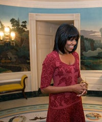 Update: Michelle Obama Got Bangs, & Her Husband Loves Them mobama-opener
