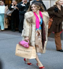 Sarah Jessica Parker & Manolo Stilettos
Yep, Manolos! From the 1970s all the way up to the turn of the century, the arching, dead-sexy stilettos created by the Spanish designer were, indeed, the toast of the Upper East Side, Monaco, and anywhere else money and high style flowed. But it was only when Sarah Jessica Parker's Sex And The City character fell into ecstatic fits over them that these works of footwear art — once primarily familiar to Vogue readers and the Bergdorf-set — became mainstream fetish objects. Now "Manolo" is a byword for sexy, flashy, often outré femme style, tied forever to the woman also known as Carrie Bradshaw.
Photo: ERIK C PENDZICH/Rex USA sarah-jessica-parker
