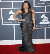 Allison Williams
Heavy metal doesn't often get much screen time at the Grammys, but Allison Williams' Kaufman Franco dress was like armor for the fashion set. The textured gown has an almost hieroglyphic look to it, with paneling that only highlights her lovely curves. The Girls star arrived on Katy Perry's arm, and maybe because of that, kept the rest of her look low-key with simple, fresh makeup and hair.
Photo:Jim Smeal/BEImages rexusa_1235247fv