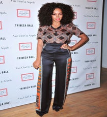 2012
There might not be a more classic Solange-style outfit: Well-tailored pants, bright colors, prints, and a killer lip. The more natural and voluminous hair is present, too — and we're just loving the perfectly coordinated Just Cavalli suit she's rocking. So Solange.
Photo: Everett Collection/Rex USA. solange-2012