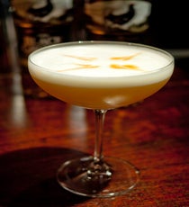 The Royal Mile
Created by Charles Joly, Aviary.
1.5 oz. The Black Grouse
.5 oz. Benedictine Liqueur
.5 oz. Earl Grey Syrup
.75 oz. Lemon Juice
Egg White
Rare Tea Cellars Bitters
Combine all ingredients aside from bitters in a mixing glass and dry shake to combine ingredients. Add ice, shake, and strain into an old-fashioned glass with ice. Decoratively add bitters to top of cocktail.
Photo: Courtesy of M Booth FINLThe Royal Mile 2