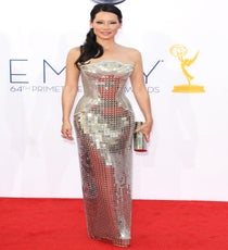 Femme-bot fab! Lucy Liu may not have even needed a bodyguard last night with all of that sumptuous sequined body armor from Versace. We're betting the paps needed to pop on some shades when the light reflected all of that heavy metal, too. (There's no way we would have shielded our eyes). Photo: Jim Smeal/BEImages emmys-dresses-lucy-liu