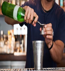 Step 1: Measure and pour lime juice into a shaker. 031_SpicyCocktails_3rd