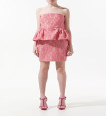 Boat Trip — This dress transforms from day to night and ceremony to reception, without missing a fashionable beat — which is particularly important when you’re out at sea. The lace and soft color add a touch of romance for the occasion, and the pencil skirt won’t fly up when a little wind hits the deck.
Zara Strapless Lace Dress With Peplum, $89.90, available at Zara.
zara