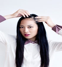 Start with dry hair. Prep your strands with product — girls with straight hair should choose a gel like Shu Uemura Art of Hair Fiber Lift Gel, while girls with natural curl should use a mousse like Kérastase Mousse Substantive. According to Finneran, the trick to getting a perfect curl is layering. Apply a small amount of product to strands, blow out hair, then apply another dollop of product and blow hair out again. If your hair doesn't hold a curl, you may need to add two to three layers of product. "Hair is stubborn and adding product is the best way to get it to do what you want. By drying the hair between layers, you ensure the product dries and is absorbed into the hair shaft." The exception to this rule is super-curly haired girls — Finneran says you should just apply a shine serum and blow dry hair once to smooth your strands and lock out frizz.
Once your hair is prepped, create a deep side-part. sleek-waves-1