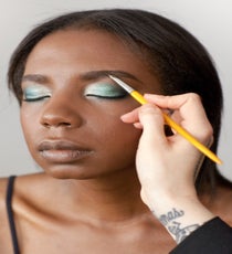 Thicken up the brows with some brow powder to create a more defined, dramatic shape. 27_HalloweenLook3_091512_234