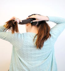 Use a hair elastic to secure each section into a ponytail. braided-hairstyle-2