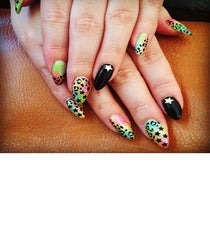 Not only does this nail technician from Marie Nails walk the walk, but she talks the talk with this tie-dye and leopard-print design. Photographed by Us Erika-(1)