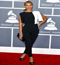 Beyoncé
As much as we love her, Beyoncé can be hit or miss when it comes to red-carpet style. But, we're definitely on board with her look last night! A two-tone jumpsuit with split shoulders sounds dangerous on paper, but the chic tailoring, high-waisted cut, and sleek ponytail made this look work in a big way.
Photo: Picture Perfect/Rex USA Beyonce - Grammys 2013